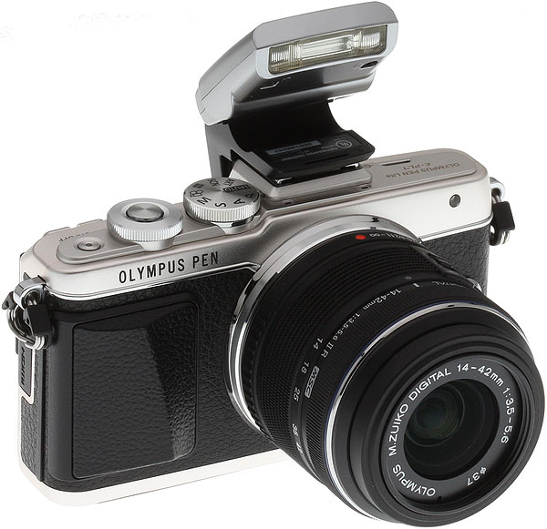 Olympus E-PL7 review -- front right view with bundled FL-LM1 flash attached