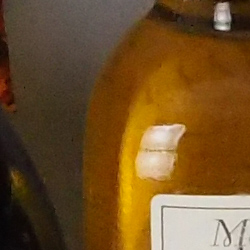 100% crop from Olympus E-PL8 test image taken at ISO 3200