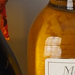 100% crop from Olympus E-PL9 test image taken at ISO 200