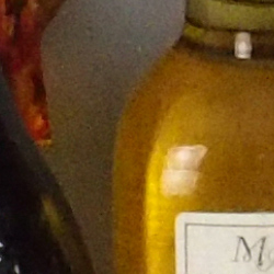 100% crop from Olympus Stylus 1 test image taken at ISO 1600
