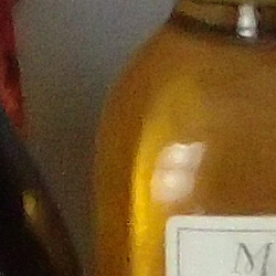 100% crop from Olympus TG-4 test image taken at ISO 800