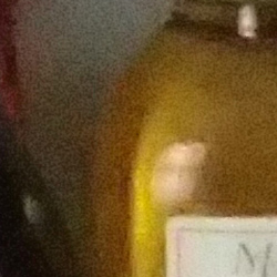 100% crop from Olympus TG-4 test image taken at ISO 3200