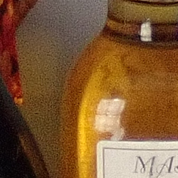 100% crop from Olympus TG-5 test image taken at ISO 400