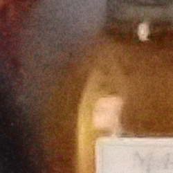 100% crop from Olympus TG-5 test image taken at ISO 12800