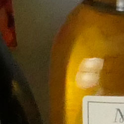 100% crop from Panasonic LX10 test image taken at ISO 3200