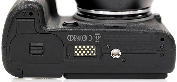Samsung NX1 review -- bottom view showing grip connector