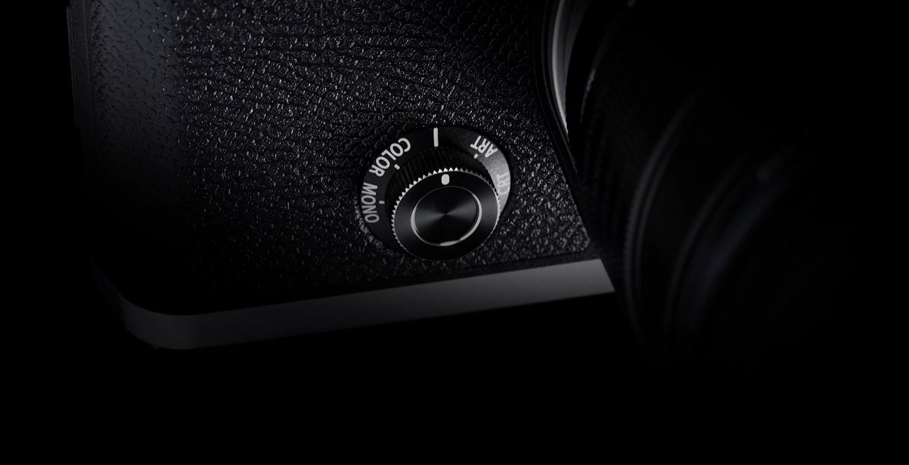 OM System camera front dial teaser. 