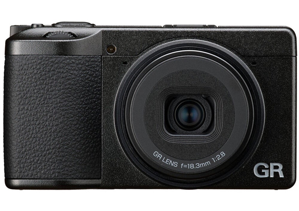 Ricoh GR IV on white background. 