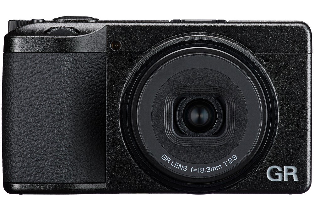 Ricoh GR IV on white background.