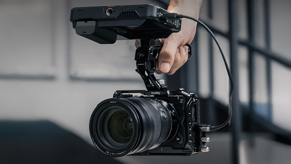 Nikon ZR with smallrig cage and top handle. 